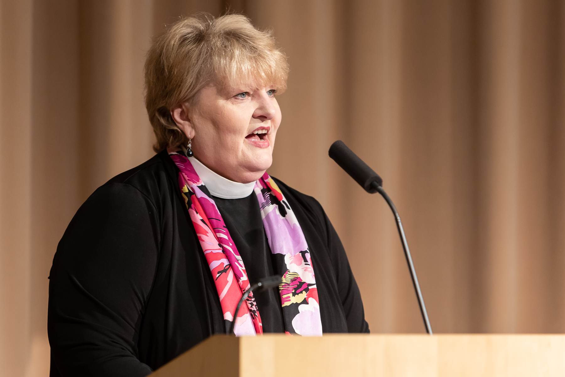The Rev. Diane Dardon, MDiv, director of religious diversity and pastoral care, offers an invocation during the luncheon. (DePaul University/Jeff Carrion)